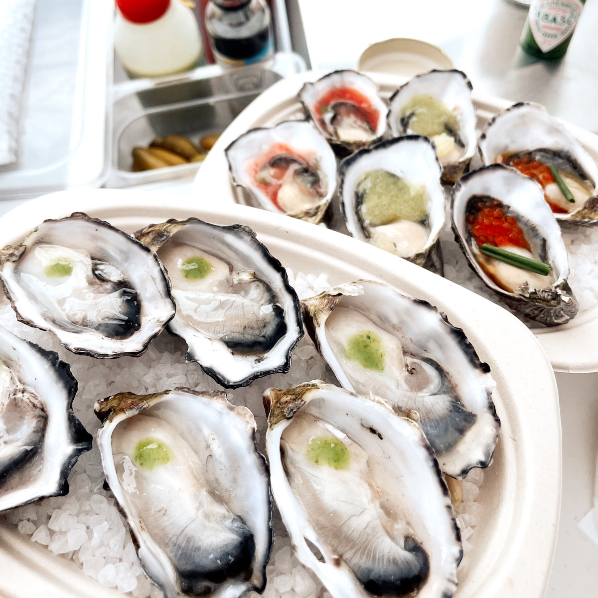 Pacific Oysters from Franklin Harbour | Shucked Oysters Hot Sauce Salmon Roe Mandarin Ponzu Watermelon | Pacific Oyster Co.